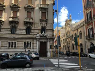 La chiesetta del Sacro Cuore. Alle spalle si intravede l'ex convento di Santa Scolastica in via Cardassi